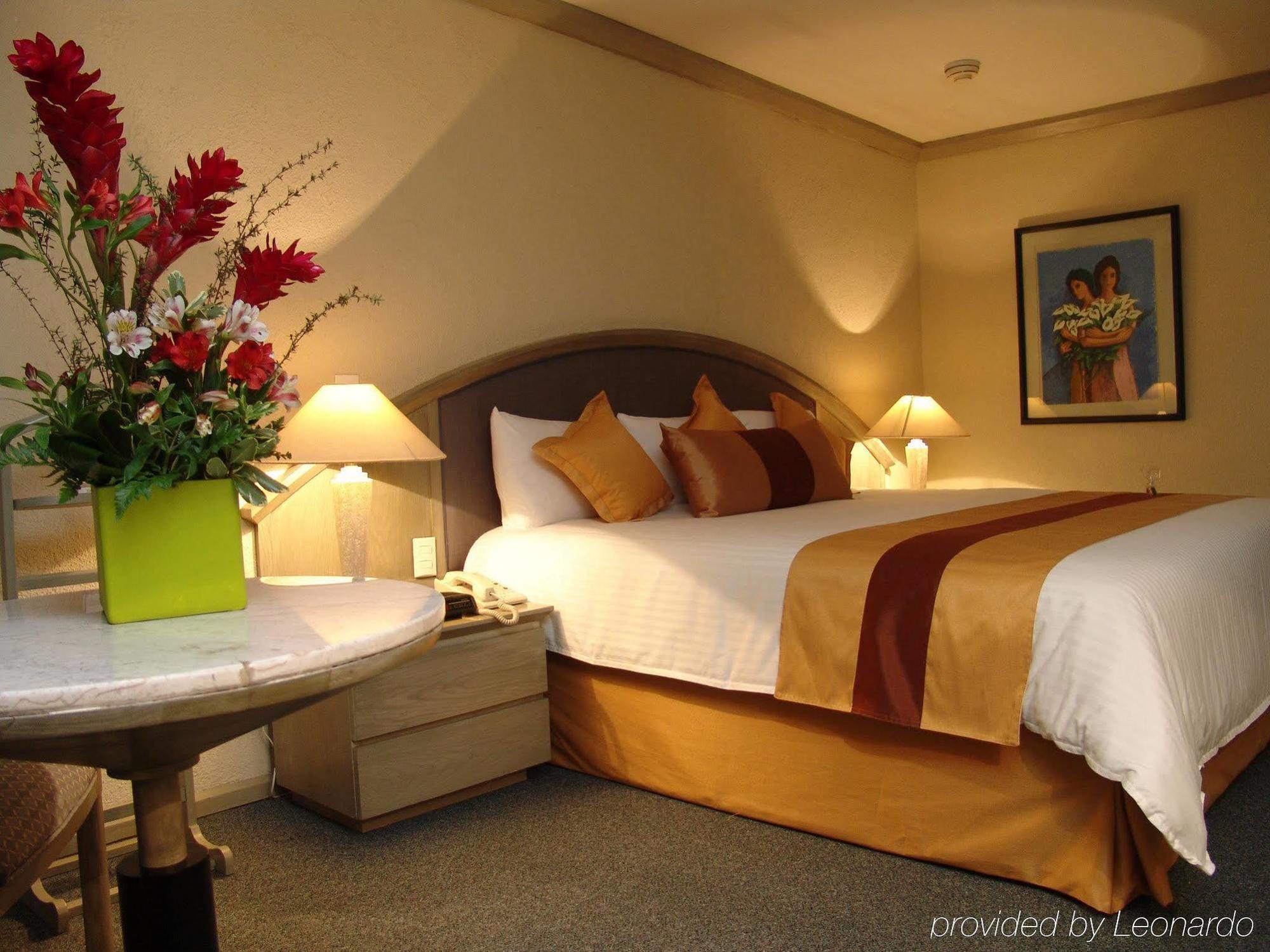 فندق راديسون بارايسو مكسيكو سيتي مدينة مكسيكو الغرفة الصورة A bedroom at the hotel